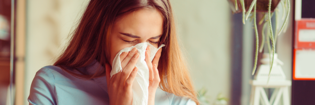 woman sneezing woman sneezing